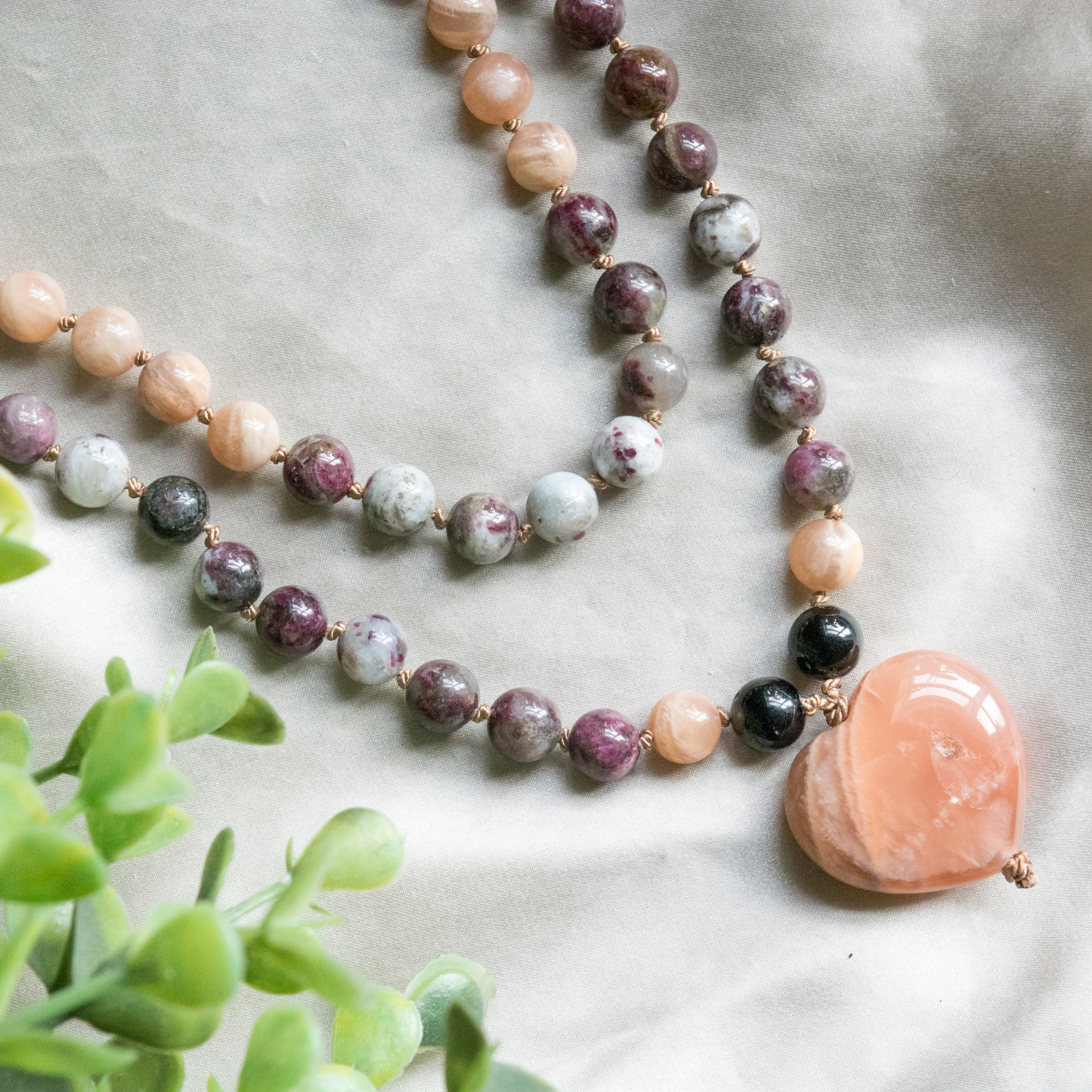 Crystal hand knotted mala for joy, balance, protection