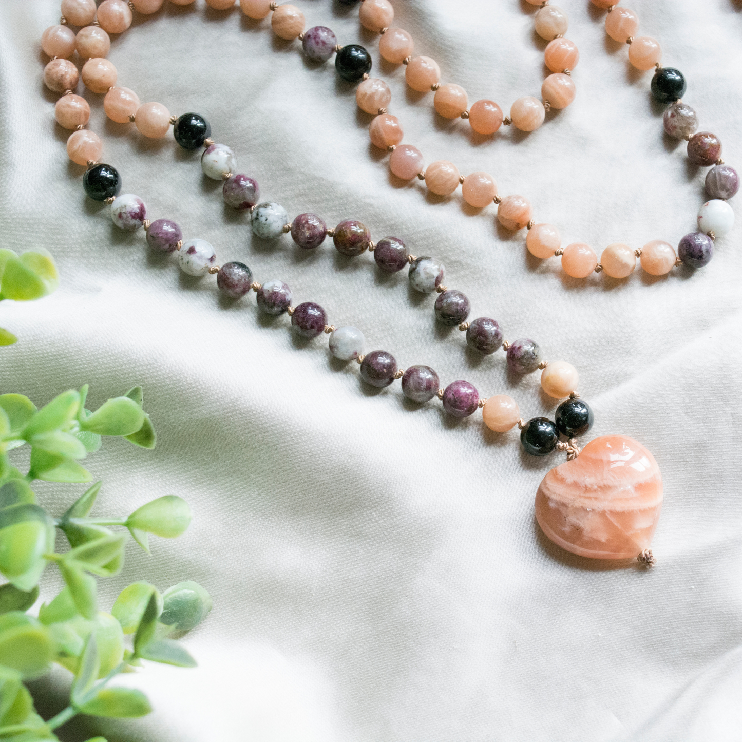 Crystal hand knotted mala for joy, balance, protection