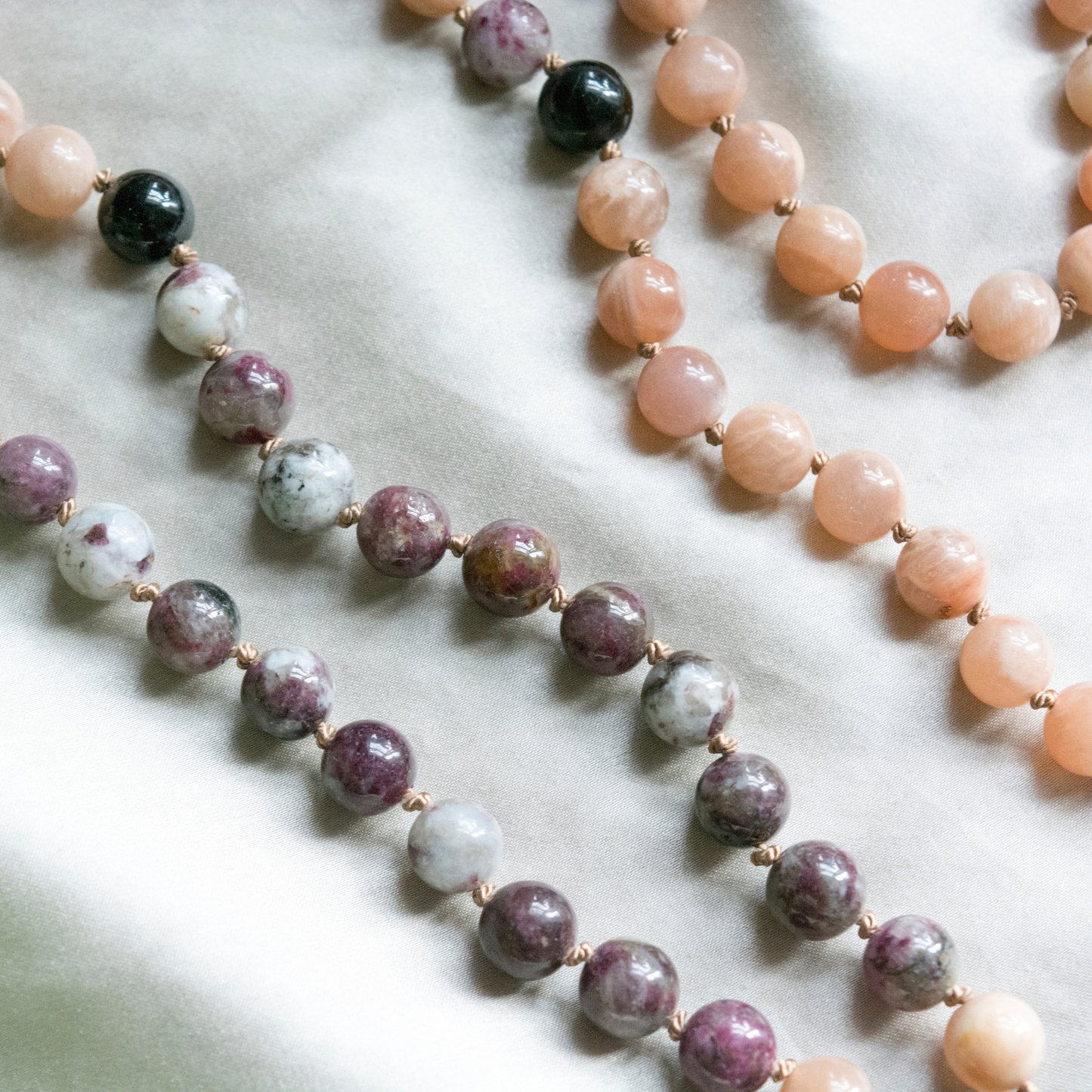 Crystal hand knotted mala for joy, balance, protection