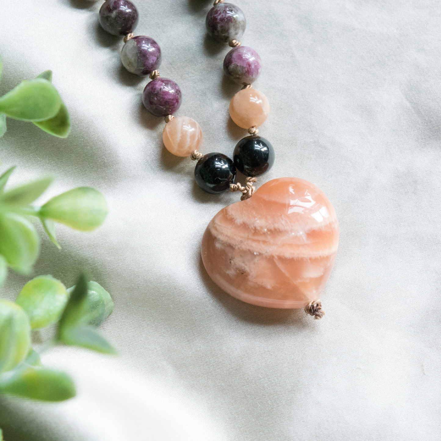 Crystal hand knotted mala for joy, balance, protection