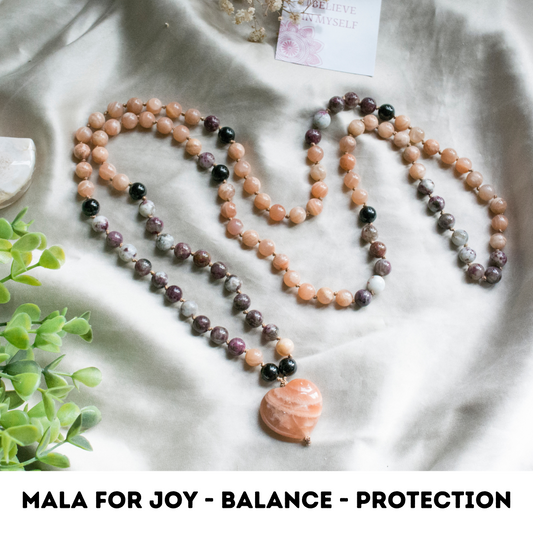 Crystal hand knotted mala  for joy, balance, protection